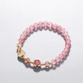 Elegant pink strawberry quartz beaded bracelet featuring 14k gold-filled decorative charms - Strawberry Quartz Elastic Bracelet / 6mm / Pink