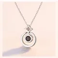 Elegant memory of love projection necklace featuring silver plated star and concentric circle pendant - Necklace / Silver