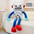 Large metallic silver robot plush doll toy resting on a white sofa in a cozy room - 60CM / Silver Style