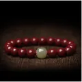 Elegant red cinnabar stone bead bracelet featuring a single pale green nephrite jade bead detail. - Hetian Jade Style / 8mm
