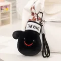 Cute black plush boxing bag character keychain with a smile and THE KING headband decoration - Black Glove