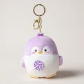 Adorable purple plush penguin keychain holding a lollipop charm for girls backpacks - 10cm / Purple