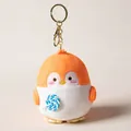 Cute orange penguin plush keychain holding a blue swirl lollipop for backpack charms. - 10cm / Orange