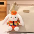 Porte-clés lapin en peluche avec uniforme de pompier orange accroché à un sac à main crème - 16cm / Lapin Pompier