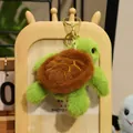Cute green and brown plush sea turtle keychain with soft fur and golden ring - Sea Turtle / 15cm