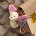 Lindo colgante de bolso de mariposa de peluche rosa con alas brillantes de tela - Colgante de Mariposa / 10cm