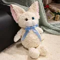 Niedliches cremefarbenes Devon Rex Stofftier mit lockigem Fell und einer glänzenden blauen Schleife - 45cm / Weiß