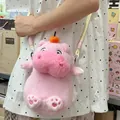 Close-up of a cute pink plush hippo crossbody bag featuring heart paw embroidery details - Capybara Lulù Phone Bag / 25cm/Pack / Pink