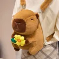 Cute brown plush Capybara animal backpack featuring a yellow flower accent for kids - Holding Yellow Flower Style / 35cm / Yellow Flower Capybara