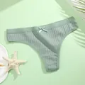 Detail view of green ribbed cotton thong panties featuring a delicate bow - M / Bean Green