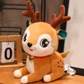 Adorabile peluche di renna seduta con campanellino d'oro per decorazioni natalizie - Lying Reindeer / 20cm