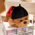 Adorable plush teddy dog toy wearing a red ladybug costume on white miniature storage drawers. - 32cm / Ladybug Cape Style / Tan