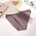Purple ribbed cotton bikini panties featuring stylish metal ring accents on a white desk - S / Khaki