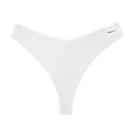 Detail van een witte string met wafelstructuur voor dames, hoog uitgesneden met merklabel. - S / Bottoms / Wit