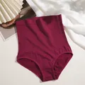 Close-up of seamless high-waist tummy control shaping panties in dark red fabric. - M / Bottoms / Burgundy