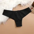 Breathable black mesh thong panty featuring a dainty center bow and delicate lace trim. - XS / Bottoms / Black