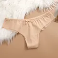 Nude seamless women's thong with delicate bow detail for comfort and breathability - XS / Bottoms / Beige