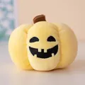 Peluche zucca di Halloween giallo con un simpatico viso ricamato da Jack-o'-lantern - Vestibilità regolare / 10cm / Giallo