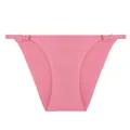 Detailed macro view of pink seamless ice silk panties featuring adjustable side straps - S / Bottoms / Caramel color