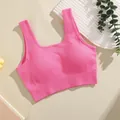 Pink ribbed sports bra with built-in chest pads for fitness and yoga activities. - Pink