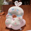 Detail view of pink bunny-shaped nap pillow with soft waffle texture for office desk - Rabbit