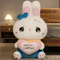 Large white plush rabbit doll holding a pink heart with a blue bow - 37cm / Blue
