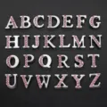 Close-up of 8mm silver metal alphabet charms with pink rhinestones for DIY bracelets. - Letter A / 8mm / Pink