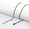 Detailed view of black stainless steel flat cross chain with secure lobster clasp for DIY - Cable Chain / 45 and 5cm Length 2.5mm Thickness / Black