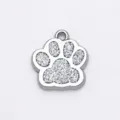 Silver dog paw shaped pendant with silver glitter filling for pet collars and DIY jewelry - 15x18mm / Silver