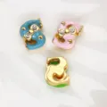 8mm alloy letter S charms with bow and rhinestones in blue, pink, and gold - Letter S