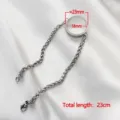 Stainless steel floating locket bracelet with curved glass pendant and 23cm total length - 23mm Frame with Wheat Chain / Silver