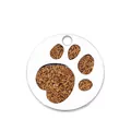 Macro detail of the brown glitter filling within the paw print pet ID tag pendant. - Dog Paw Print (HC485) / Orange
