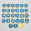 Detailed view showing a set of 26 blue enamel round alphabet charms with gold borders - Letter-M / Blue