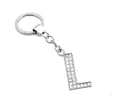 Premium silver alloy keychain featuring a sparkling rhinestone-encrusted English letter L pendant - Silver L