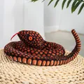 Realistic coiled cobra plush toy with vibrant orange and black patterns for kids - Red Coiled Snake