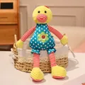 Soft colorful stuffed plush duck toy wearing blue polka dot overalls and striped limbs - Duck / 30cm
