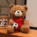 Cute brown teddy bear plush toy wearing a red soccer jersey and holding a soccer ball - 16cm / Brown Bear Red Green Stripes (Portugal)