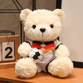 Simpatico orsetto di peluche color crema con maglia da calcio tedesca e pallone - Orso Bianco Patchwork Bianco (Germania)