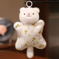 Llavero de peluche de gato blanco con cuerpo en forma de estrella y flores amarillas - Gatito blanco
