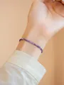 Delicate 2mm natural lavender amethyst beaded bracelet shown worn on a slender wrist - Length 14+4cm Extension Chain / Purple