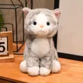 Close-up of a realistic grey and white striped plush cat toy with blue eyes - Sitting Style - Gray Cat / 15cm
