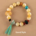 Natural Bodhi seed bracelet featuring a gourd charm and decorative blue-green tassel - Moving Ring Gourd Style / White