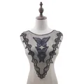 Detailed view of black water-soluble lace collar with butterfly embroidery on mannequin - LG143 / Black