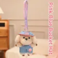 Adorable plush dog keychain accessory wearing a pink and blue bucket hat and denim outfit - Beige With Denim Pants Style / Pink Blue Fisherman Hat
