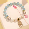 Handgefertigtes Aquamarin- und weißes Achat-Armband mit goldenem Traumfänger-Anhänger - Aquamarin Quasten-Armband
