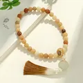Traditionelles Bodhi-Samen Gebetsarmband mit Lotus-Anhänger aus Jade und langer Quaste - Gelbes Muster Sechs-Wort-Mantra Handheld