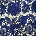 Close-up detail of navy blue water-soluble lace with 3D floral and feather embroidery - 150码装 / Dark Blue