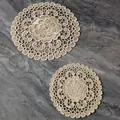 Detailed view of intricate cream lace embroidery on vintage style circular coasters. - 15cm / Freesia Pattern (Beige)