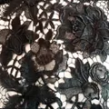 Close-up detail of black water-soluble lace with 3D hollow floral embroidery texture - 150码装 / Black