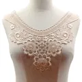 Detailed macro view of cream water-soluble lace floral embroidery fake collar on mannequin - Beige